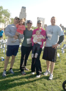 As a team we accomplished our first goal during a 5k race Four runners who have finished a 5K run, some with children
