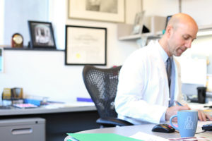 David Gerber, MD, likes to start every day in his office.