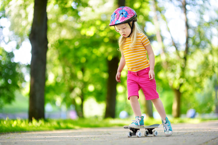 Image of little girl skateboarding