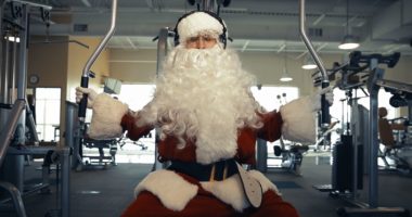 Santa using a weight machine