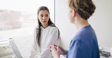 Female patient talks to female provider