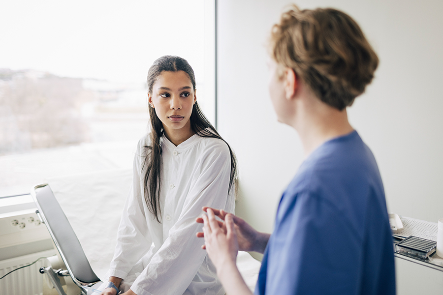 Female patient talks to female provider