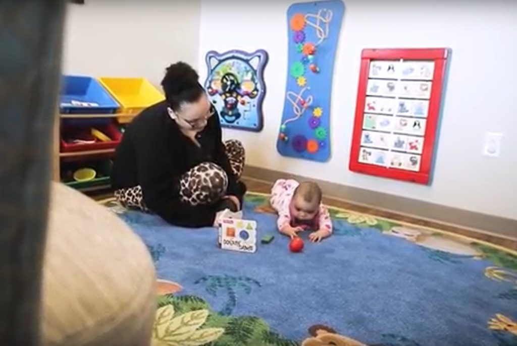 UNC Horizons patient Katelin Hunter plays with her daughter