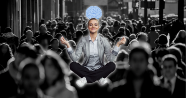 woman in color meditating on top of a black and white crowd in a city