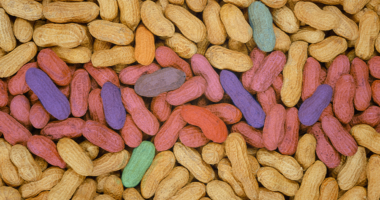 A photo of a pile of colorful peanuts