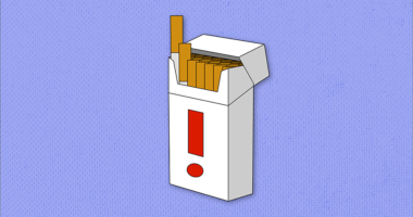 A cigarette box with a warning label.