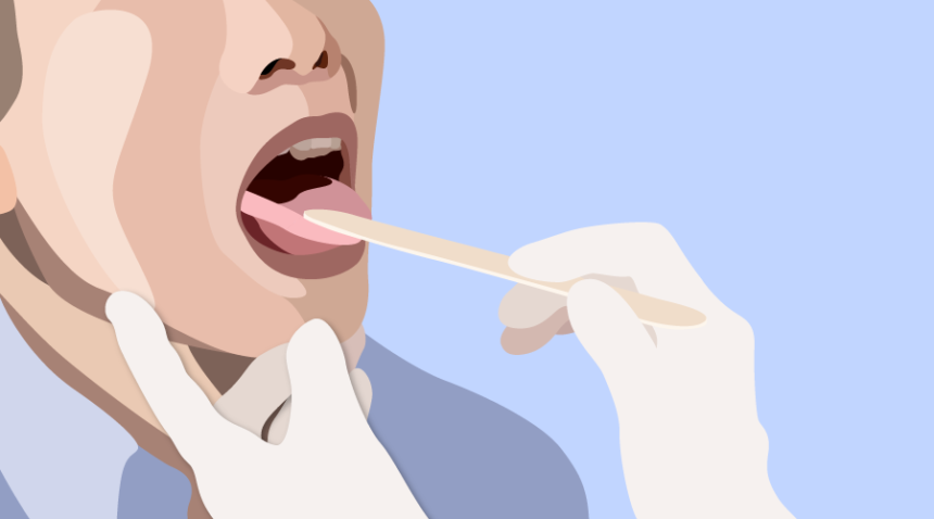 patient sticking out tongue with tongue depressor