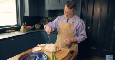 Man prepares holiday meal in the kitchen