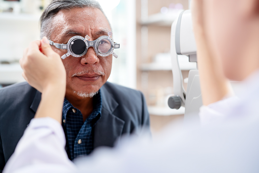 Adult patient undergoing an ophthalmologic examination