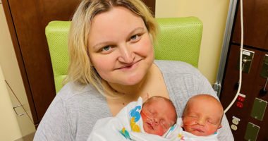 Ashley Long with her newborn twin babies.