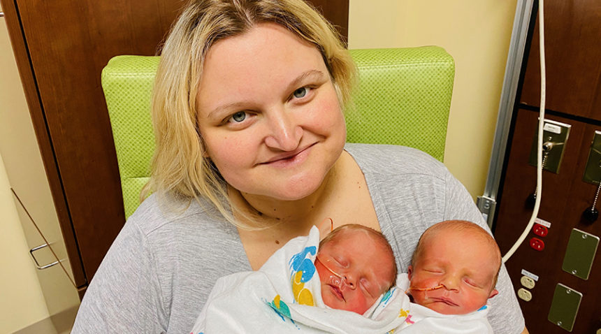 Ashley Long with her newborn twin babies.