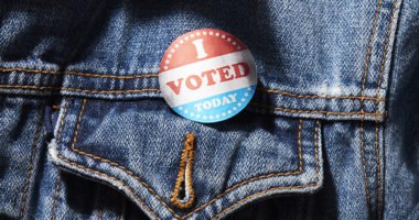 "I voted today" button pinned on a jean jacket