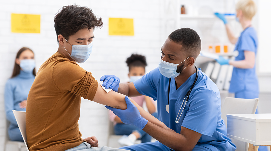 Covid-19 Vaccination. Male Patient Gets Vaccinated