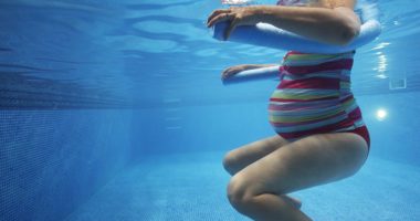 Pregnant woman in swimming pool