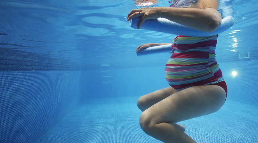 Pregnant woman in swimming pool