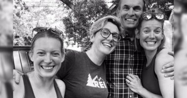 Gary’s family enjoying a happy moment together outside.