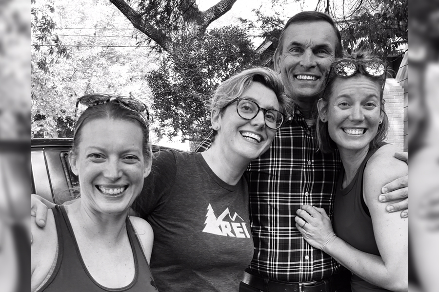 Gary’s family enjoying a happy moment together outside.